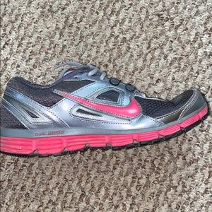 Nike Dual Fusion ST women’s tennis shoes.